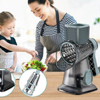 Rotary drum cheese and vegetable grater used in the kitchen