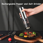 Electric grinder seasoning a steak, one-handed