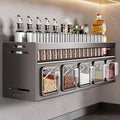 Wall-mounted spice rack with five airtight jars and a shelf for bottles